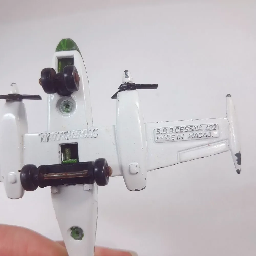 MATCHBOX Sky Busters 1974 SP9 Cessna 402 plane Airplane Macau Diecast green